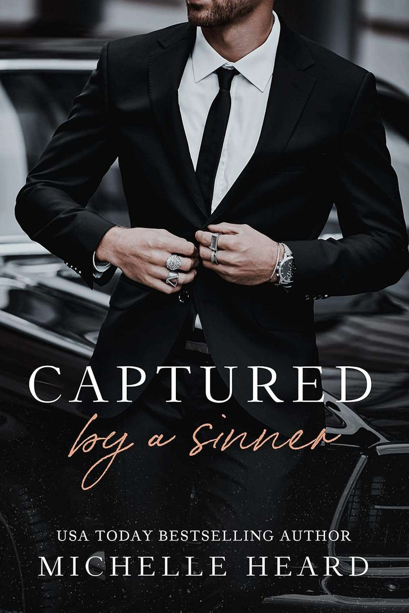 Captured By A Sinner (The Sinners Series) by Michelle Heard